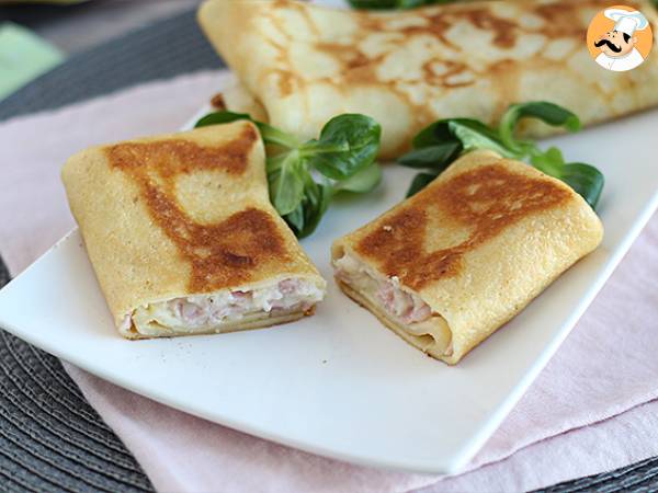 Pannkakor fyllda med béchamelsås, ost och skinka